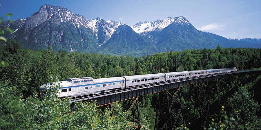 A scenic view of the Canadian Rockies from a train